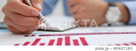 Group of people deliberate on problem with infographics 60407165