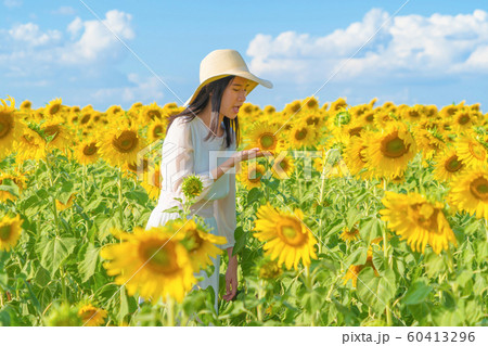 Portrait of happy Asian woman enjoying and 60413296