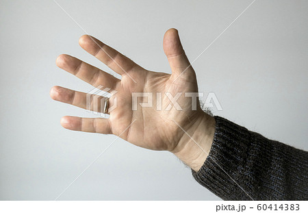 Male palm on gray 60414383