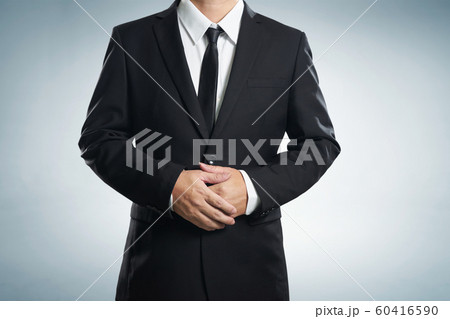 Confidence businessman in black suit , close up . Confidence businessman in black suit , close up . 60416590