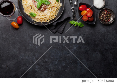 Spaghetti bolognese pasta and wine Spaghetti bolognese pasta and wine 60418008