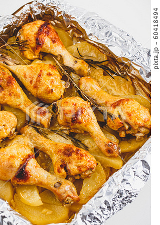 Chicken Legs Baked with Potatoes 60418494