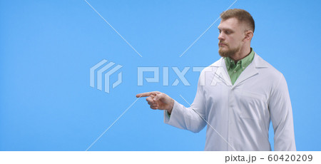 Young scientist pointing right Young scientist pointing right 60420209