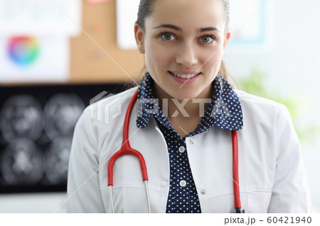 Cheerful attractive female at working place 60421940