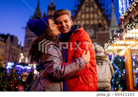 happy young couple have fun on Christmas market 60422103