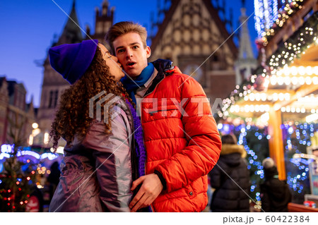 happy young couple have fun on Christmas market 60422384