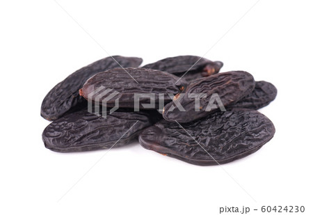 Tonka beans isolated on white background. Bean of Dipteryx odorata, cumaru or kumaru. Fresh aroma tonka beans. 60424230