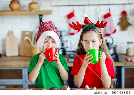 Good morning. Brother and sister drink tea at the Good morning. Brother and sister drink tea at the 60443301