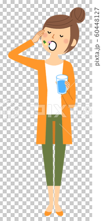 Young woman taking medicine 60448127