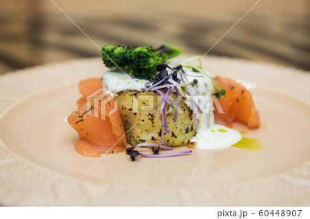 Potato casserole with broccoli and salmon 60448907