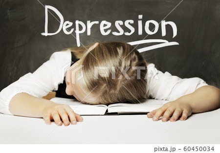 Sad Tired schoolgirl with books. Depression Sad Tired schoolgirl with books. Depression 60450034