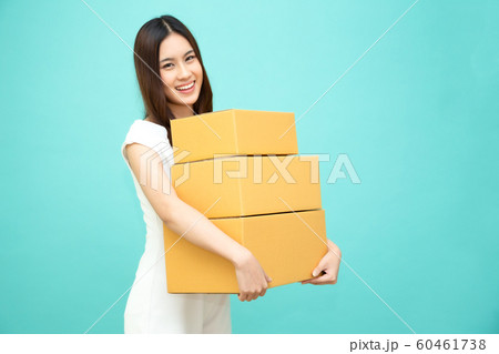 Happy Asian woman holding package parcel box, Happy Asian woman holding package parcel box, 60461738