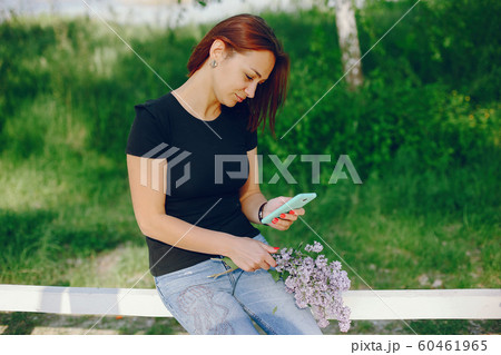 Girl in a park 60461965