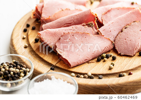 Sliced roast beef. Tasty fresh meat. Sliced roast beef. Tasty fresh meat. 60462469