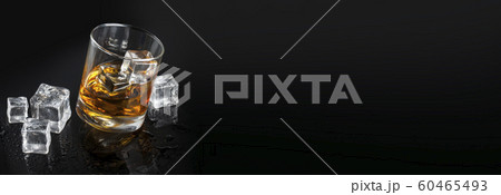 glass of whiskey with ice background glass of whiskey with ice background 60465493