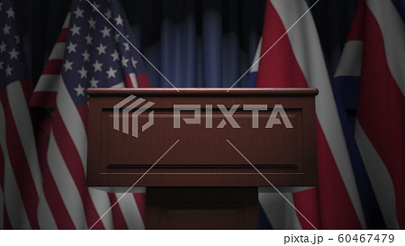 Many flags of Costa Rica and the USA behind speaker tribune, 3D rendering 60467479