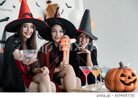 Group young Asian women in costume witch celebrate Group young Asian women in costume witch celebrate 60469730