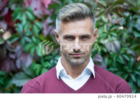 Facial care and ageing. Attractive mature man. 60470914