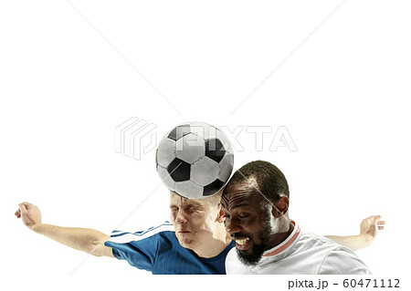 Close up of emotional men playing soccer hitting the ball with the head on isolated on white background 60471112
