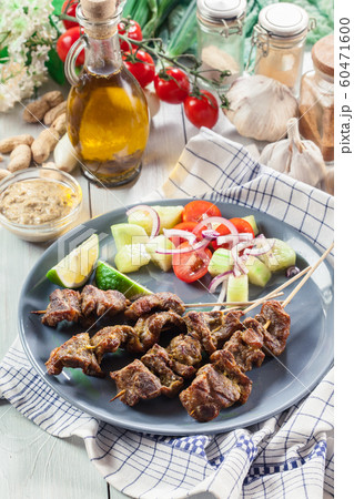Traditional pork satay with peanut sauce and 60471600
