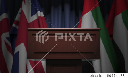 Flags of the UAE and the United Kingdom at international meeting, 3D rendering 60474123