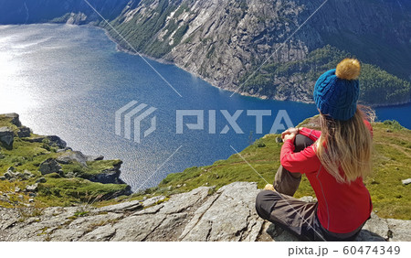 Contemplation of a beautiful fjord in Norway 60474349