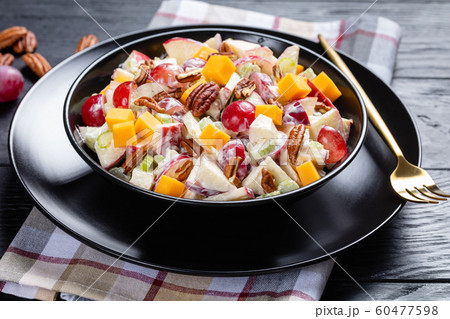 close-up of fresh apple salad with grapes close-up of fresh apple salad with grapes 60477598