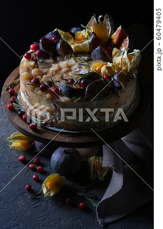 Cheesecake with fruit on a holder and with a napkin 60479405