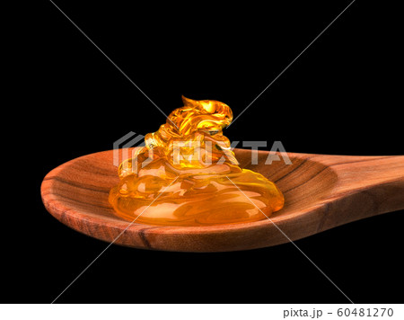 Falling and flowing honey on a wooden spoon isolated on black with clipping path Falling and flowing honey on a wooden spoon isolated on black with clipping path 60481270