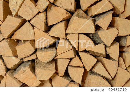 The texture of the wall is firewood, which is laid 60481710