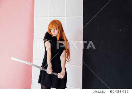 woman anime with red hair with Japanese samurai sword woman anime with red hair with Japanese samurai sword 60483415