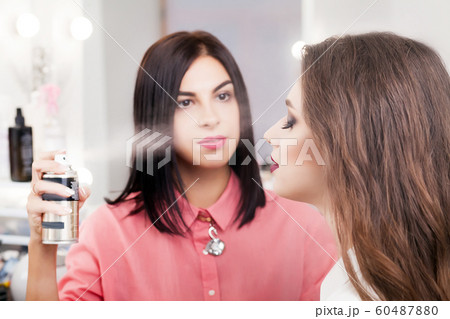 Beauty Girl with Makeup Brush. Natural Make-up for Brunette Beauty Girl with Makeup Brush. Natural Make-up for Brunette 60487880