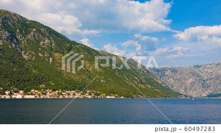 Bay of Kotor, in summer day. Perast and mountains Bay of Kotor, in summer day. Perast and mountains 60497283