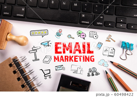 Email marketing concept. Computer keyboard and stationery Email marketing concept. Computer keyboard and stationery 60498422