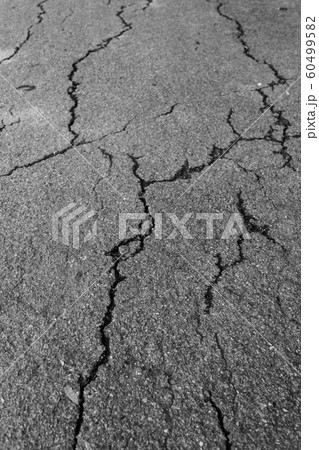 crack background texture of rough asphalt 60499582
