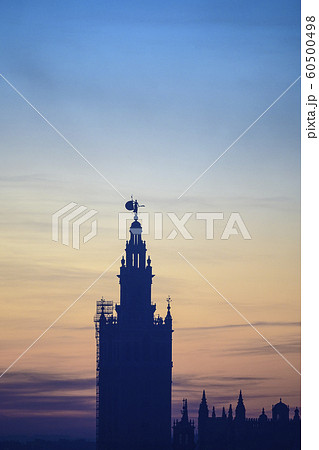 Silhouette of Giralda at sunrise in Seville, Andalusia, Spain 60500498
