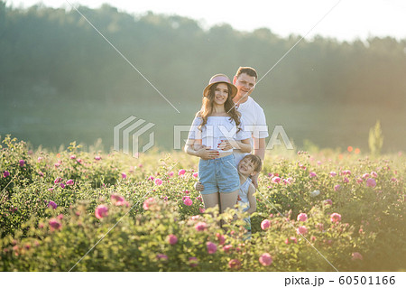 Family couple of togetherness in a field of flowers. 60501166