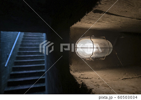 Stone stairs in an old German bunker . Stone stairs in an old German bunker . 60503034