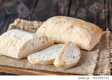 Ciabatta on wooden board 60508742
