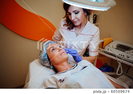 Cosmetology procedures on the face in clinic 60509674