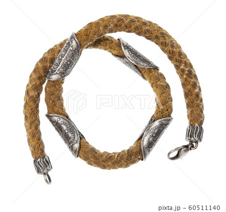 coiled necklace with ancient silver coins isolated 60511140