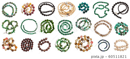 set of various coiled strings of beads isolated 60511821