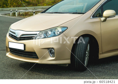 Photo of the front of the car in gold Photo of the front of the car in gold 60518421