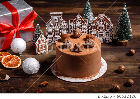 Christmas holiday table with delicious truffle cake Christmas holiday table with delicious truffle cake 60522126