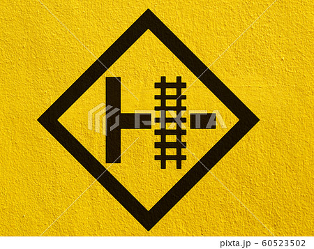 warning train sign painted on a stucco wall 60523502