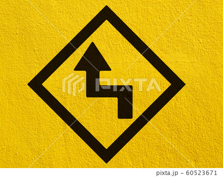 a black arrow points painted on a stucco wall a black arrow points painted on a stucco wall 60523671