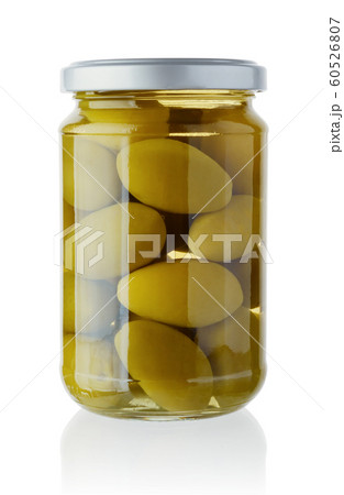 Green olives in a glass jar isolated on white 60526807