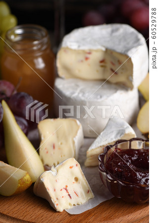 Antipasti. Cheese camembert with fruit and wine Antipasti. Cheese camembert with fruit and wine 60529788