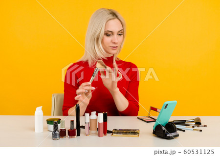 Candid shot of cute young Caucasian woman blogger Candid shot of cute young Caucasian woman blogger 60531125