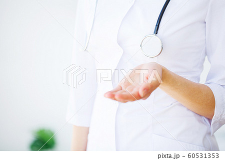 Doctor Woman With Stethoscope In Hospital. Concept Of The Global Healthcare And Medicine Doctor Woman With Stethoscope In Hospital. Concept Of The Global Healthcare And Medicine 60531353